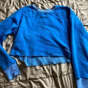 UO BDG distressed crop sweater